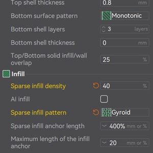 May include: Screenshot of a 3D printing software interface with various settings. Features include wall loops, top/bottom shells, infill density at 40%, and sparse infill pattern set to Gyroid. The interface is displayed on a dark gray background.