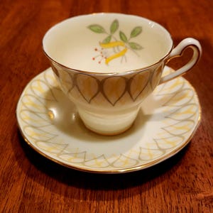Vintage Salisbury Bone China England Art Deco style Hand Painted Yellow Floral Teacup and Saucer