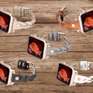 May include: Five braided leather Apple Watch bands in different colors: white, brown, gray, black, and white. Each band has a rose gold buckle and is shown with a smartwatch.