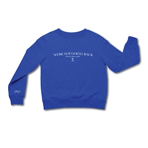 May include: A royal blue sweatshirt with the text "WE'RE NOT GOING BACK" and "Rumble Verse 2024" in white lettering. The sweatshirt has a white "770" on the left sleeve.