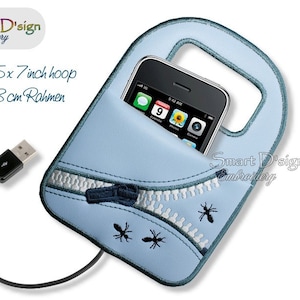 May include: A light blue phone case with a zipper detail and embroidered ants. The case has a handle and a pocket for a phone. A black USB cable is attached to the case. The text "Smart D'sign Embroidery" is visible on the case.