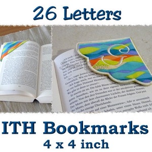 May include: A set of 26 alphabet letter bookmarks, each measuring 4 inches by 4 inches. The bookmarks are made of fabric with a colorful, wavy design and a white embroidered letter. The text "ITH Bookmarks" and "4 x 4 inch" is also visible in the image.
