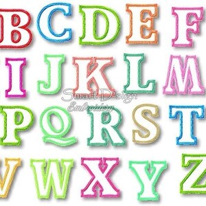 May include: A colorful alphabet with each letter outlined in a different color. The letters are in a bold, blocky font style. The letters are arranged in alphabetical order.