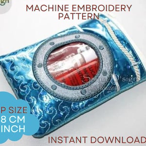 May include: Machine embroidery pattern for a blue and white pouch with a silver porthole design. The pouch is 5x7 inches or 13x18 cm.