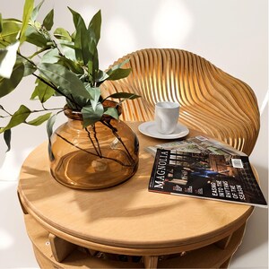 Moondream parametric modern egg chair with coffee table – sculptural plywood lounge chair with organic curves and contemporary design.