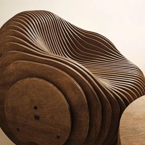 Moondream parametric modern egg chair – sculptural plywood lounge chair with organic curves and contemporary design.