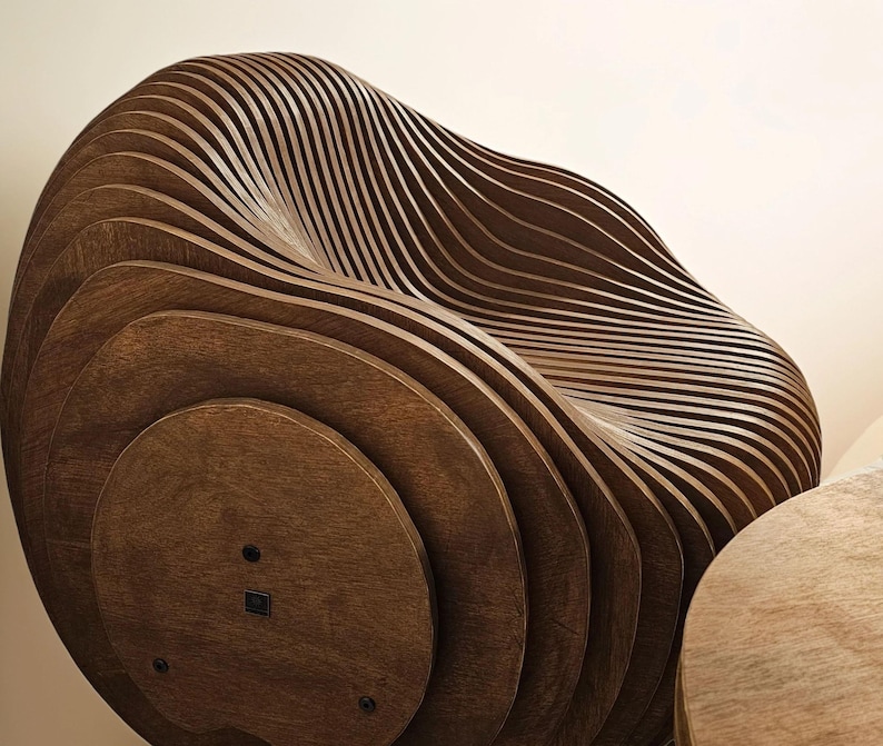 Moondream parametric modern egg chair – sculptural plywood lounge chair with organic curves and contemporary design.