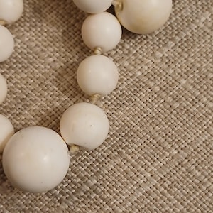 white angelskin coral necklace