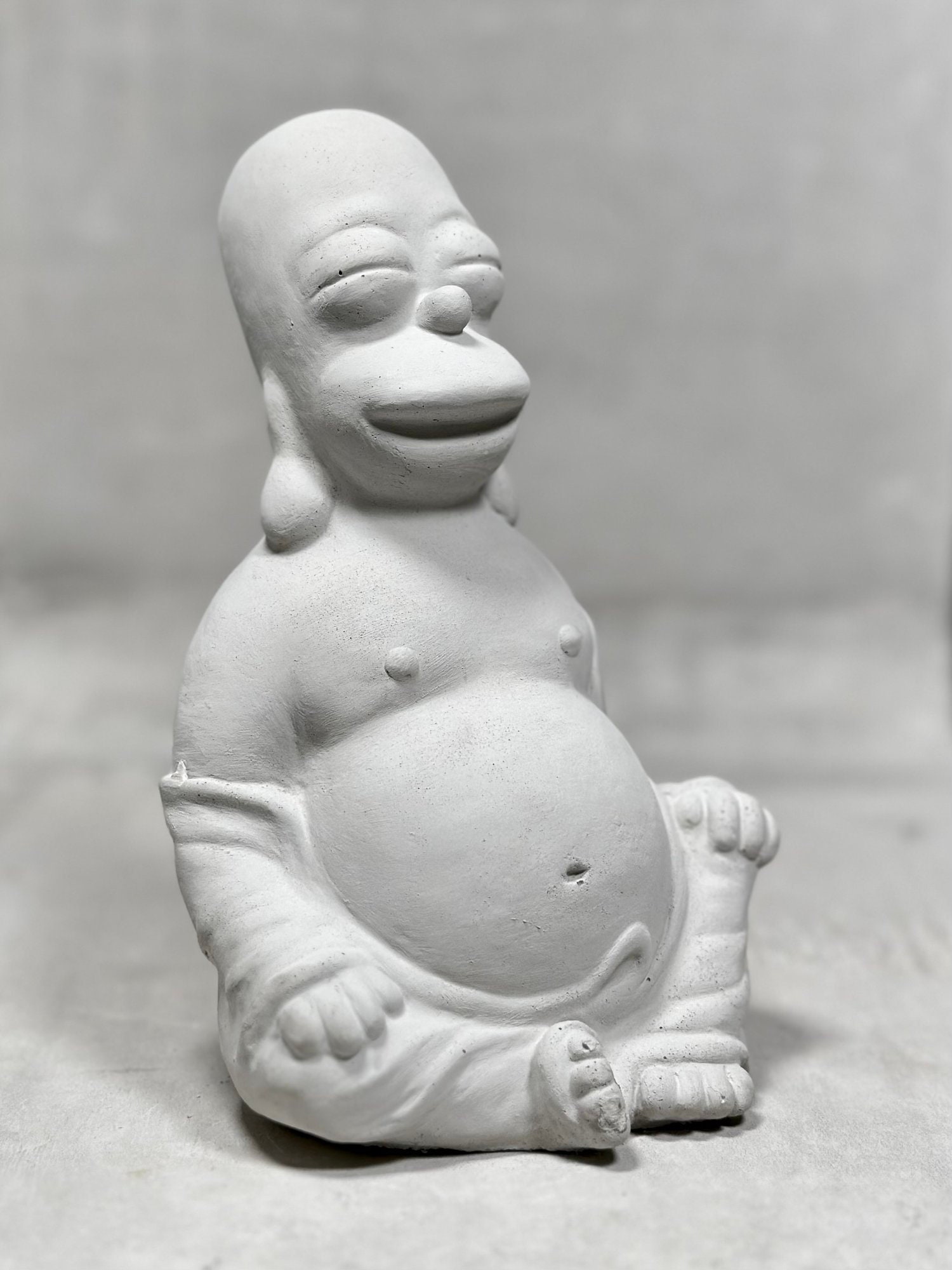 Homer Simpson Boeddha beton van Jon Ansted