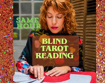 May include: A person with curly auburn hair wearing a black floral shawl over a colorful patterned shirt, performing a tarot card reading on a red surface. The image features the green text SAME HOUR and BLIND TAROT READING on a brown background.
