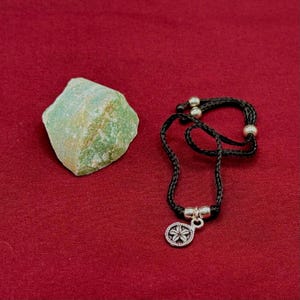 Adjustable Black Cord Anklet with a Silver Flower Charm