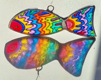 Painted glass fish with swirly design. Sun/light-catcher. Reflects coloured light. Beautiful, unique gift. Birthdays, Christmas, anytime.