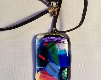 Large 4 x 3 cms fused dichroic glass pendant on 20 inch  black leather cord. Beautiful, colourful gift. Christmas. Birthdays. Anytime gift.