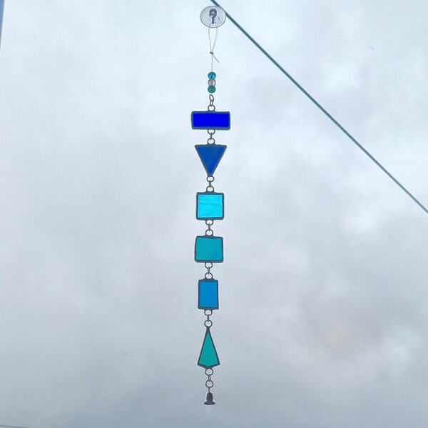 Blue glass hanging with crystal beads and bells. 30cms drop. Reflects colours. Unusual gift. Birthdays. Valentine's. Mother's Day. Anytime.
