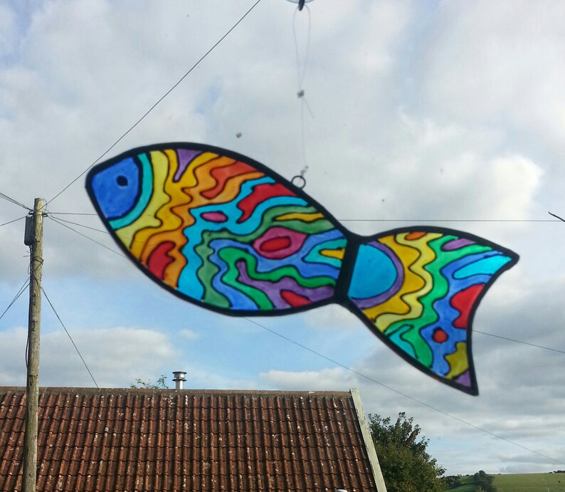 Painted glass fish. 16cms/6.5 length. Reflects coloured Etsy