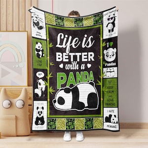 May include: A black and white panda-themed blanket with the text "Life is better with a Panda." The blanket features panda illustrations and phrases like "Keep Calm and Love Pandas."