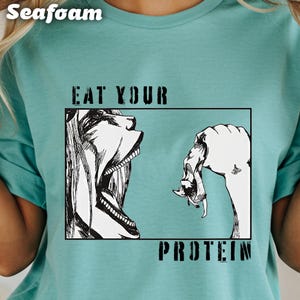 Eat Your Protein T-Shirt, Funny Graphic Tee, Unique Design Shirt, Trendy Casual Shirt, Humorous Fitness Apparel, Workout Motivation Tee
