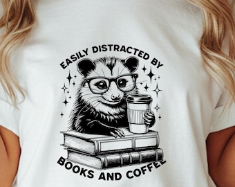 Easily Distracted by Books and Coffee T-Shirt, Raccoon Lover Gift, Bookworm TShirt, Funny Animal Shirt, Coffee Addict Top