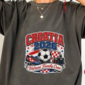 Croatia 2026 Vatreni Family Crew t-shirt with soccer ball and scoreboard.