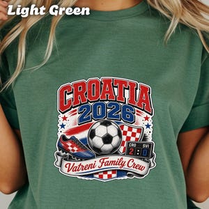 Croatia 2026 Vatreni Family Crew with soccer ball, cleats, and scoreboard.