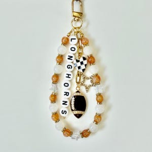 Brelok do kluczy z motywem piłki nożnej, koszykówki lub baseballu Longhorns z koralikami: pomarańczowy, wypalony brelok do kluczy z zawieszkami w kształcie serca i gwiazdy