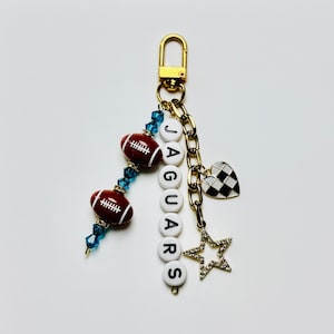 Jaguars Football Beaded Keychain: Gold Bag Charm with Enamel Heart and Star