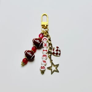 Chiefs Football Beaded Keychain: Gold Bag Charm with Enamel Heart and Star