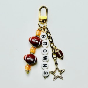 Browns Football Beaded Keychain: Gold Bag Charm with Letter & Football Beads, Enamel Heart and Star Charm