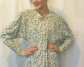 Nicole Miller vintage 80's Rayon dolman sleeve blouse in black and white swirl print.
