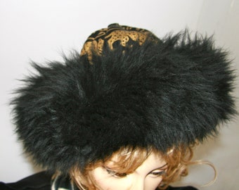 Sheepskin trim, lining and outer luxurious band make this Royal Handmade hat.