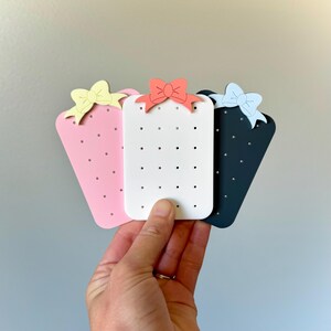 Mini örhängeshållare i akryl för resor, smyckesorganisatör med rosettdesign, bärbar örhängesförvaring för resor och presenter, resetillbehör