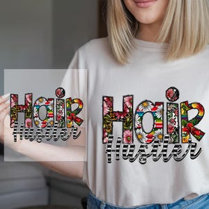 May include: A white t-shirt with a floral design that says "Hair Hustler".