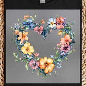 May include: A watercolor illustration of a heart shape made of flowers. The flowers are in shades of pink, yellow, blue, and purple. The heart is on a gray background.