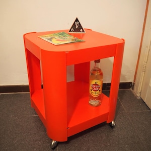 Orange Space Age bar trolley/ plastic side table on wheels, 1970s