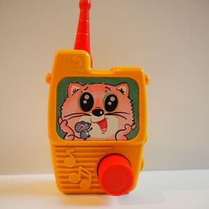 Vintage baby toy, musical wind up phone radio with cat and mouse, by Sankyo made in Japan, 1970s