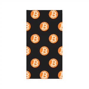 May include: A black rectangular item with a repeating pattern of orange circles, each containing a stylized "B" symbol. The "B" symbols have a textured, grainy appearance. The background is solid black.