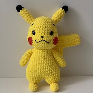 Pikachu. Handmade soft toy, amigurumi toy. A good gift for kids and adults.