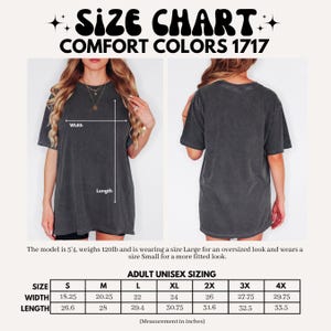 May include: A size chart for Comfort Colors 1717 t-shirts. The chart includes measurements in inches for adult unisex sizes S through 4X. The image shows a model wearing the shirt and provides sizing information for an oversized or fitted look.