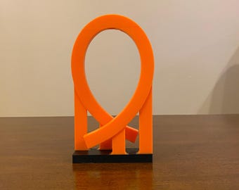 Decoración de escritorio con bucle vertical impresa en 3D