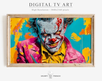 Può includere: Una stampa d'arte digitale di un clown con una giacca rosa e una camicia gialla, su uno sfondo colorato di blu, giallo e arancione. Il clown ha un sorriso sinistro e vernice rossa schizzata sul viso.