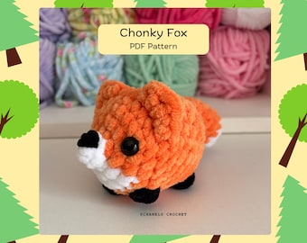 May include: A crocheted fox in orange and white, with black details. The fox has large black eyes and is labelled "Chonky Fox PDF Pattern". The background features colourful yarn and a decorative border with trees.