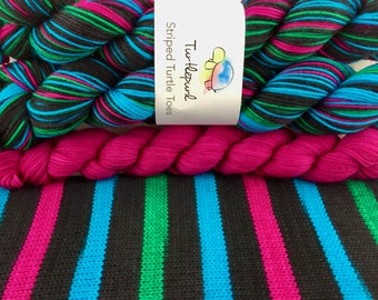 Comic Strip - With Bright Fuchsia Heel and Toe - Hand Dyed Self Striping Sock Yarn