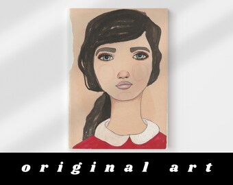 Quirky Portrait Art - Original portrait of a woman with black hair on vintage book paper. Unique, funky wall art, hand drawn portrait art.