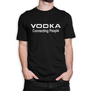 May include: Black t-shirt with white text that reads "VODKA Connecting People".