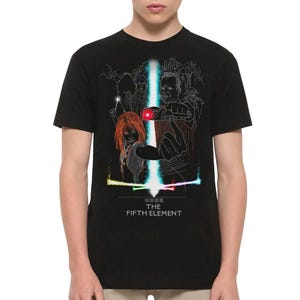 May include: Black t-shirt featuring a white outline of the characters from the film "The Fifth Element". The characters are holding weapons and standing in front of a city skyline. The text "The Fifth Element" is printed below the image.