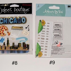 May include: Two packs of dimensional stickers, one with a Chicago theme and the other with a White House theme. The Chicago pack includes a pizza slice, a harmonica, a skyline, and the words "The Windy City". The White House pack includes a white building with a green lawn and a small American flag.