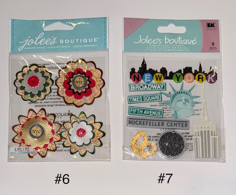 May include: Two packages of New York City themed stickers. The first package has four stickers with a floral design and the text "NYC". The second package has nine stickers with images of the Statue of Liberty, a manhole cover, and buildings. The text "New York" is on the package.