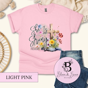 She Is Strong T-Shirt | Proverbs 31:25 Christian Tee | Inspirational Faith Shirt | Bible Verse Floral Tee | Faith Based Tee | Gift For Her