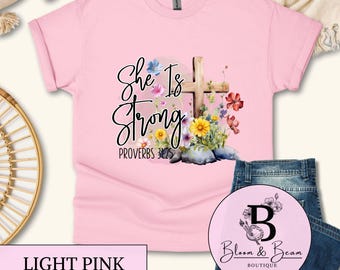 She Is Strong T-Shirt | Proverbs 31:25 Christian Tee | Inspirational Faith Shirt | Bible Verse Floral Tee | Faith Based Tee | Gift For Her