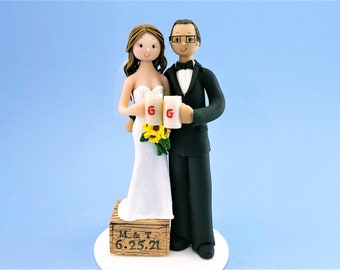 Short Bride & Tall Groom Holding a Pint Of Beer Custom Wedding Cake Topper - By MUDCARDS
